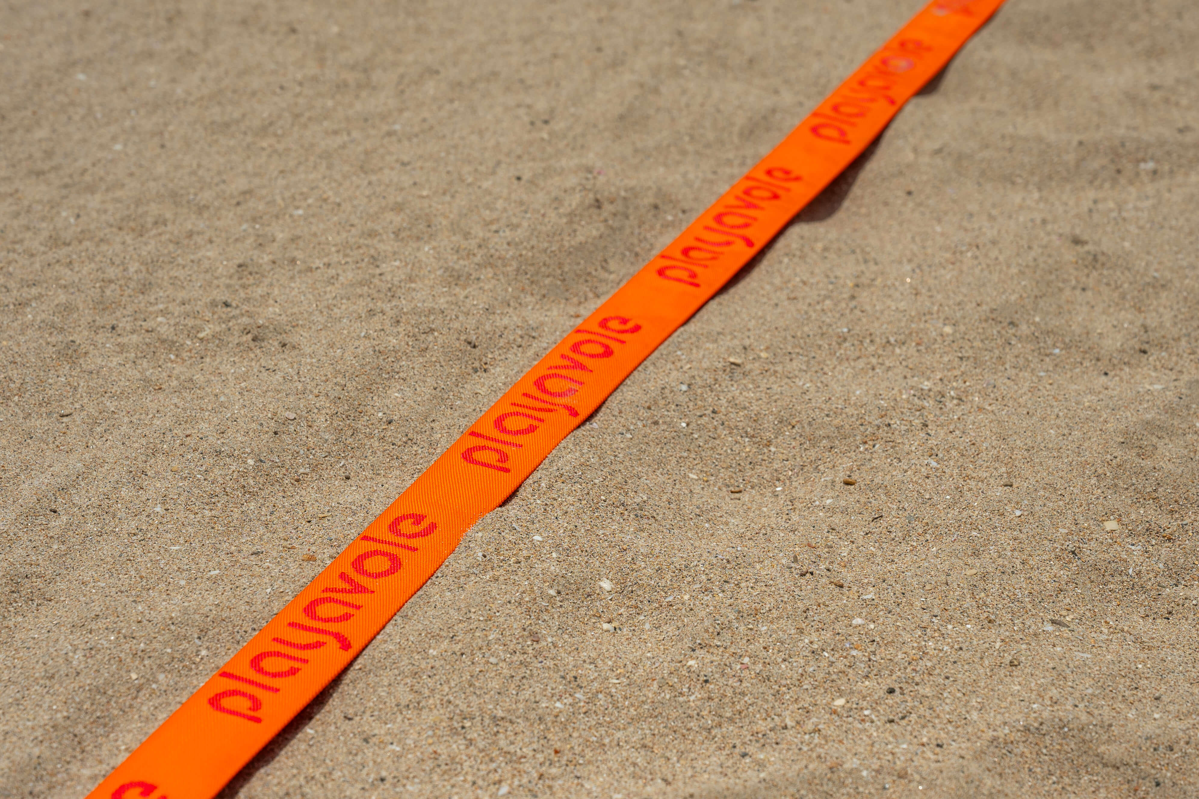 Orange UV Resistant Rally Court Sideline with repeating logo for Rally On and Speed Rally.