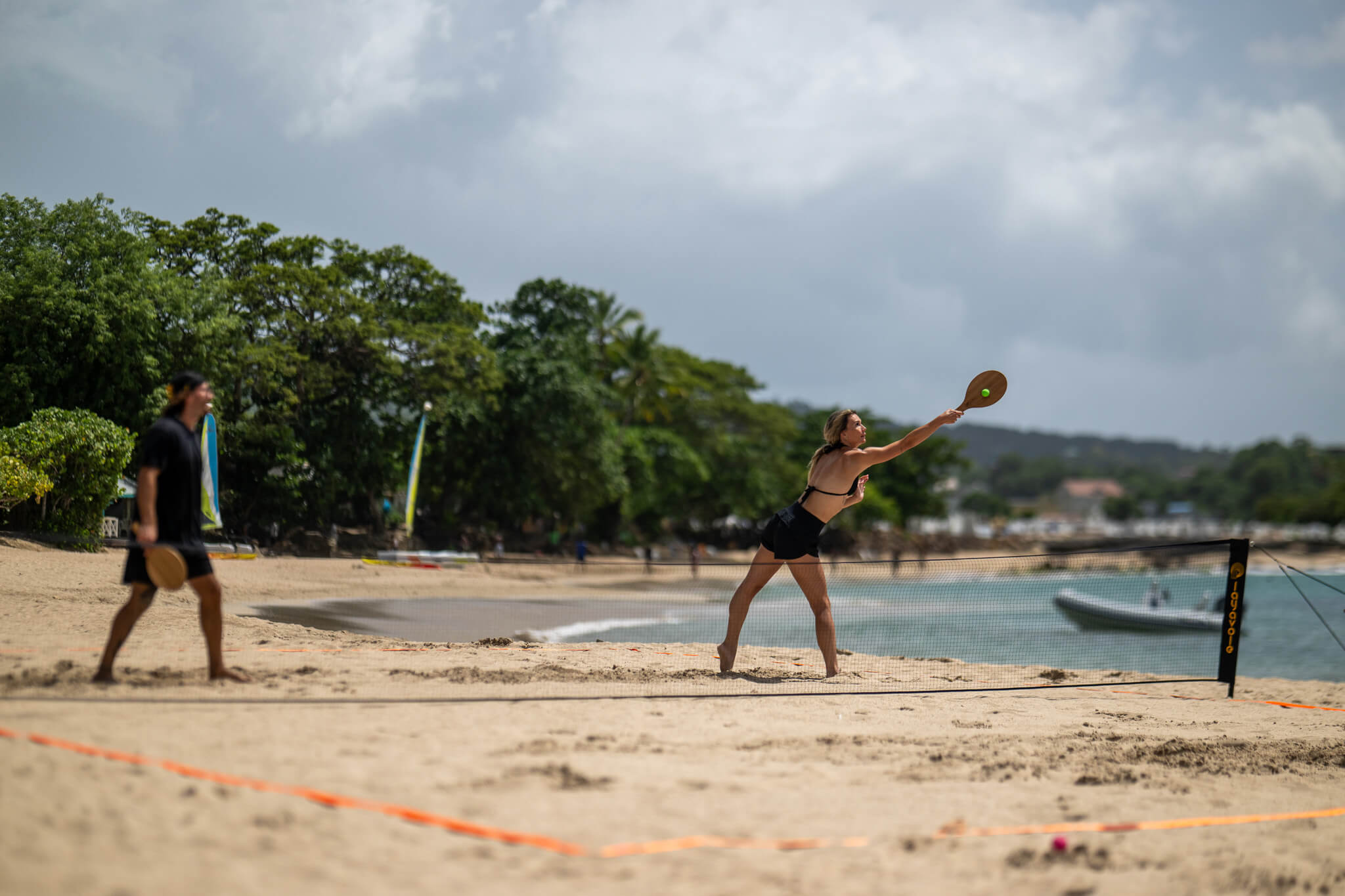 Blond girl hitting green Vole Drop in Rally On